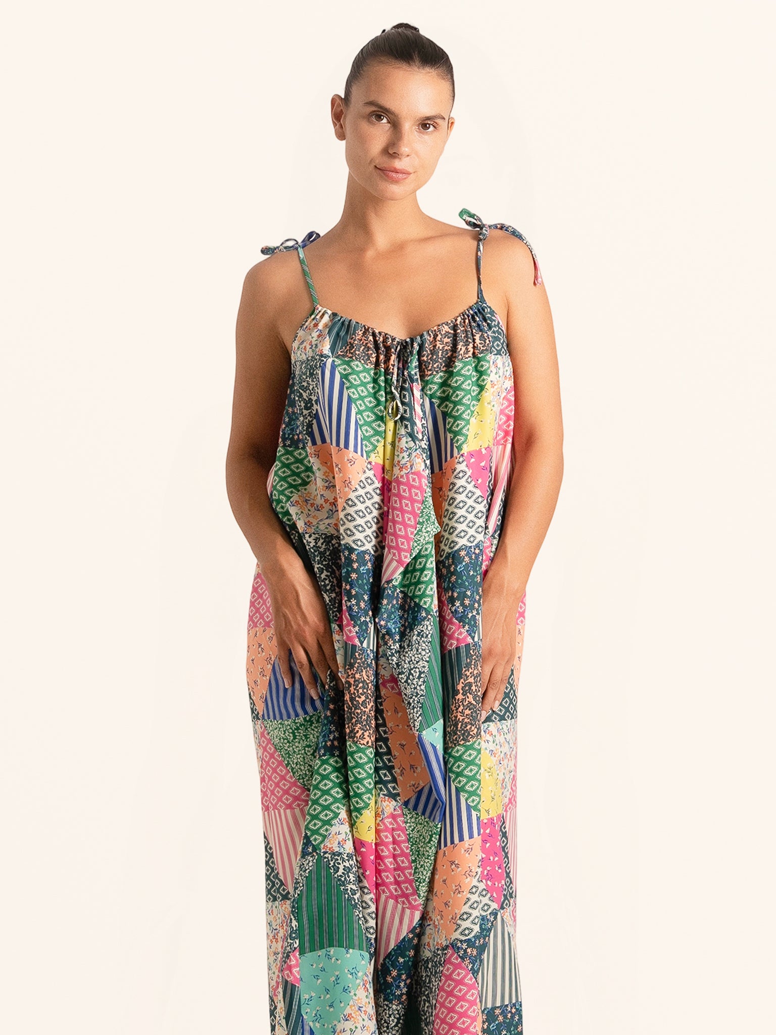 Front view of colorful patchwork maxi dress with tie shoulder straps