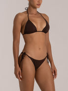Side angle of woman in chocolate brown halter bikini – summer-ready two-piece swimsuit design