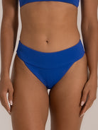 Front close-up of textured blue bikini bottom with fold-over waistband