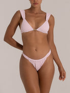 Front view of matching mint green bikini set with scoop neck top and high waist bottom