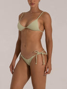 Front view of woman modeling green ribbed bikini set with triangle top and matching side-tie bottoms.