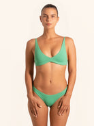 Front view of green textured bikini top with supportive underband and soft straps.