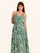 Front view of green floral maxi dress with spaghetti straps and V neckline