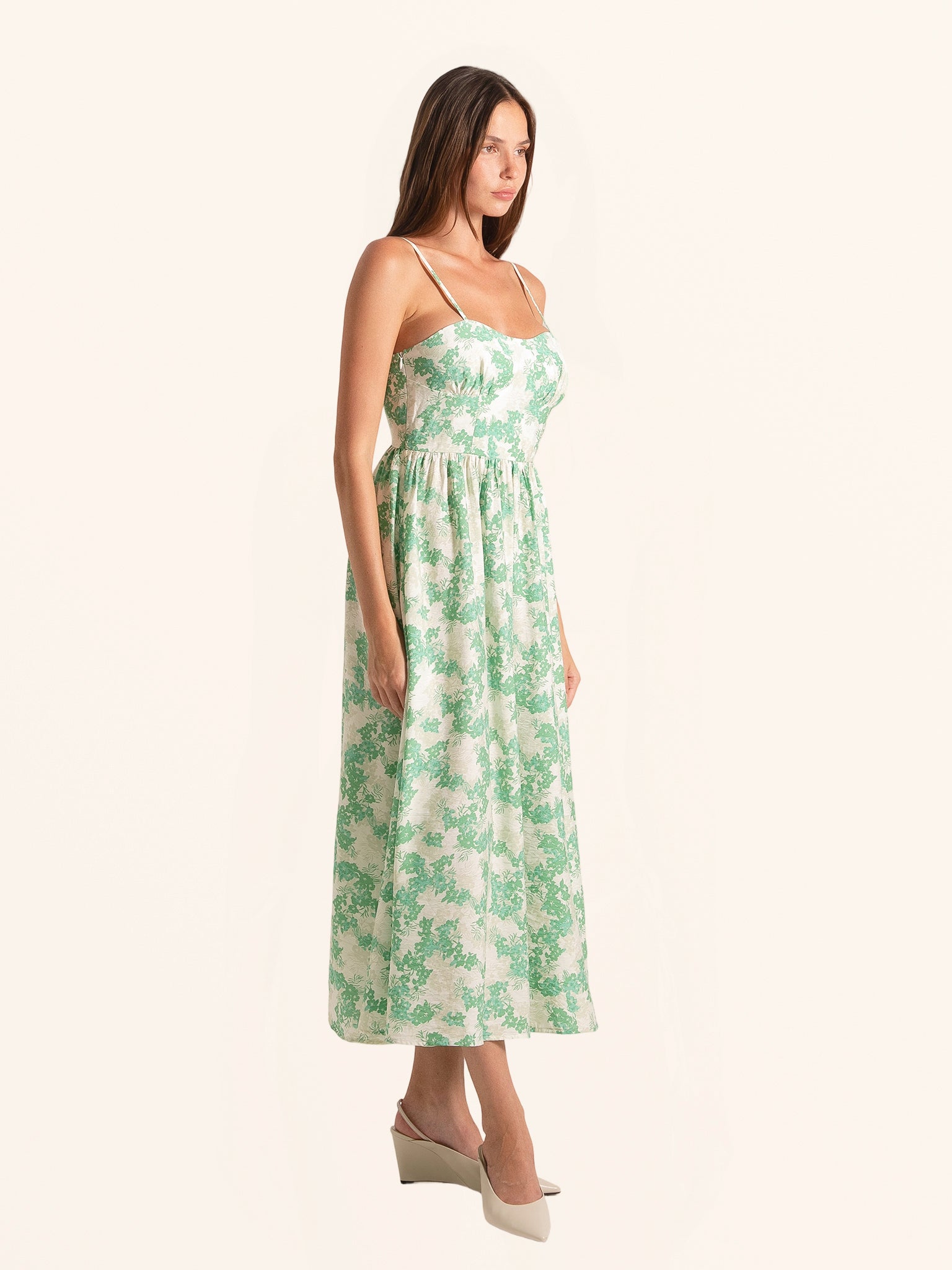 Full length front look of green floral midi dress with casual summer style