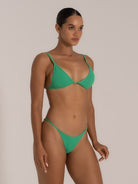 Side view of green bikini top with triangle cups and stretch fabric detailing.