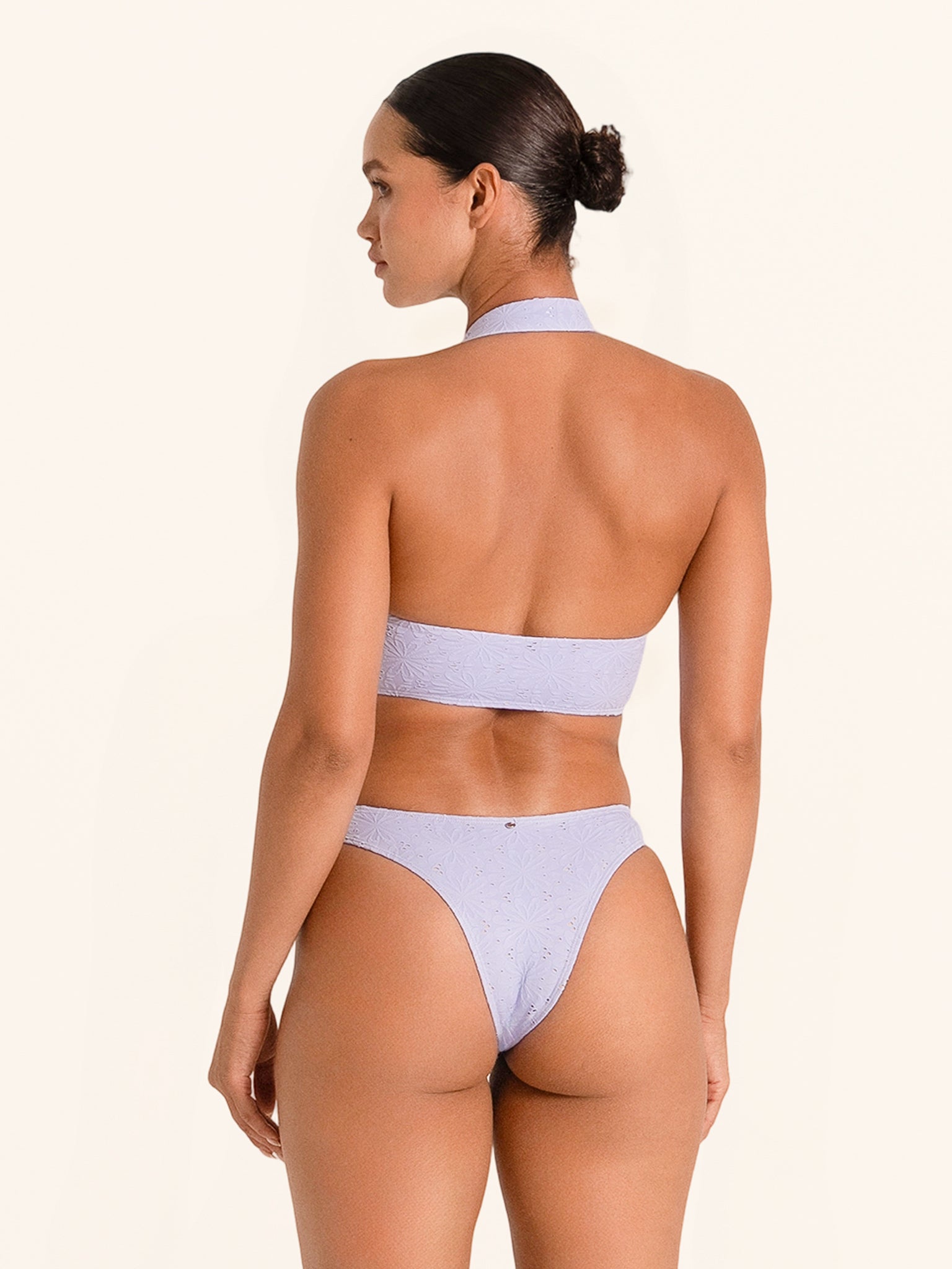 High leg lilac bikini bottom with cutout feature and flattering fit.