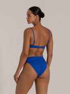 Back view of royal blue high-rise bikini bottom with sculpting fit