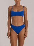 Front view of royal blue high-waisted bikini bottom with wide waistband