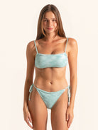 Front view of ice blue bandeau bikini top with thin adjustable straps.