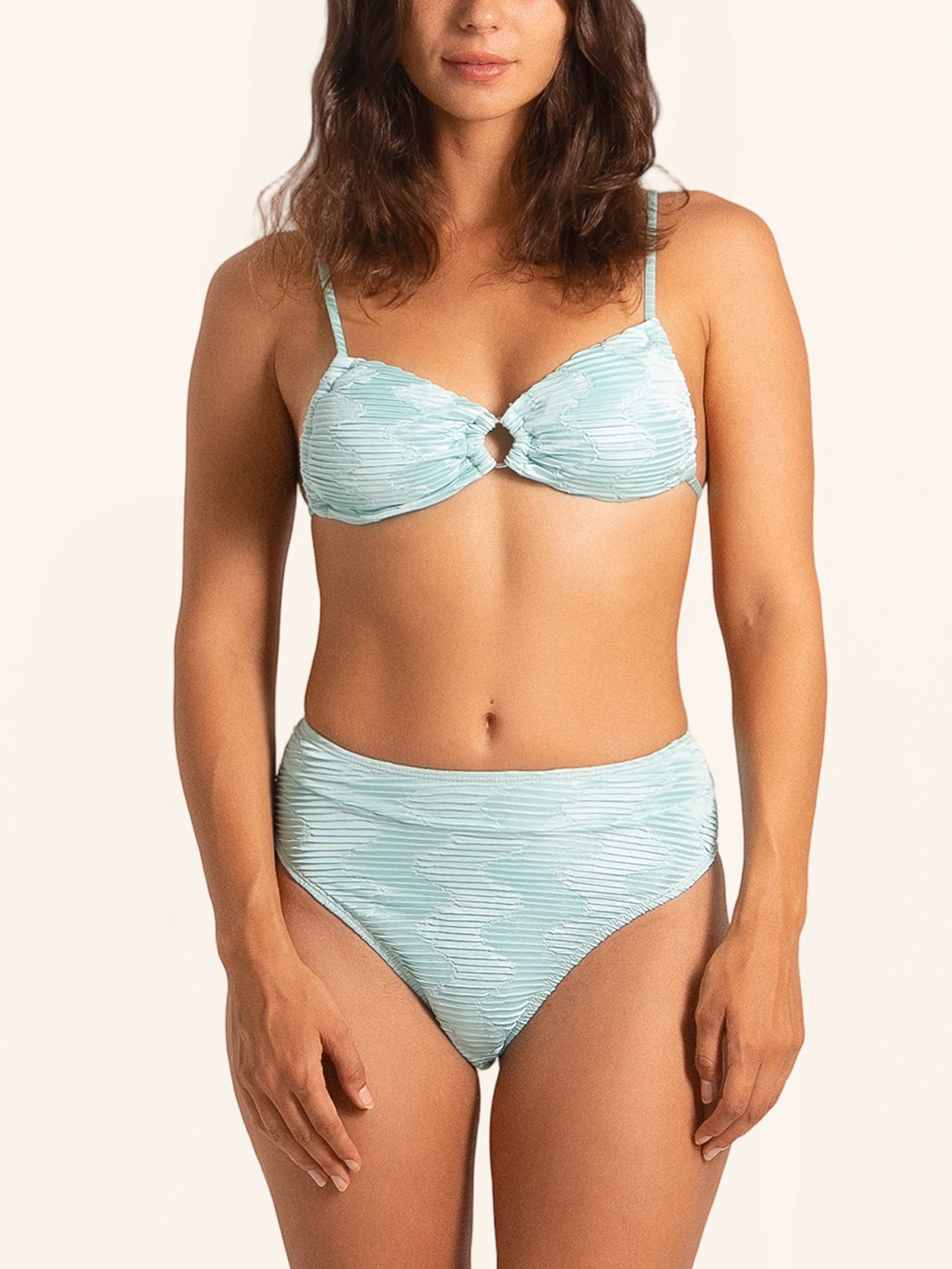 Front view of ice blue ribbed high-waist bikini bottom with sleek design.