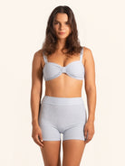 Light blue striped swim shorts with a flattering high waist fit.