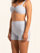 Women’s light blue swim shorts with comfortable stretch fabric.