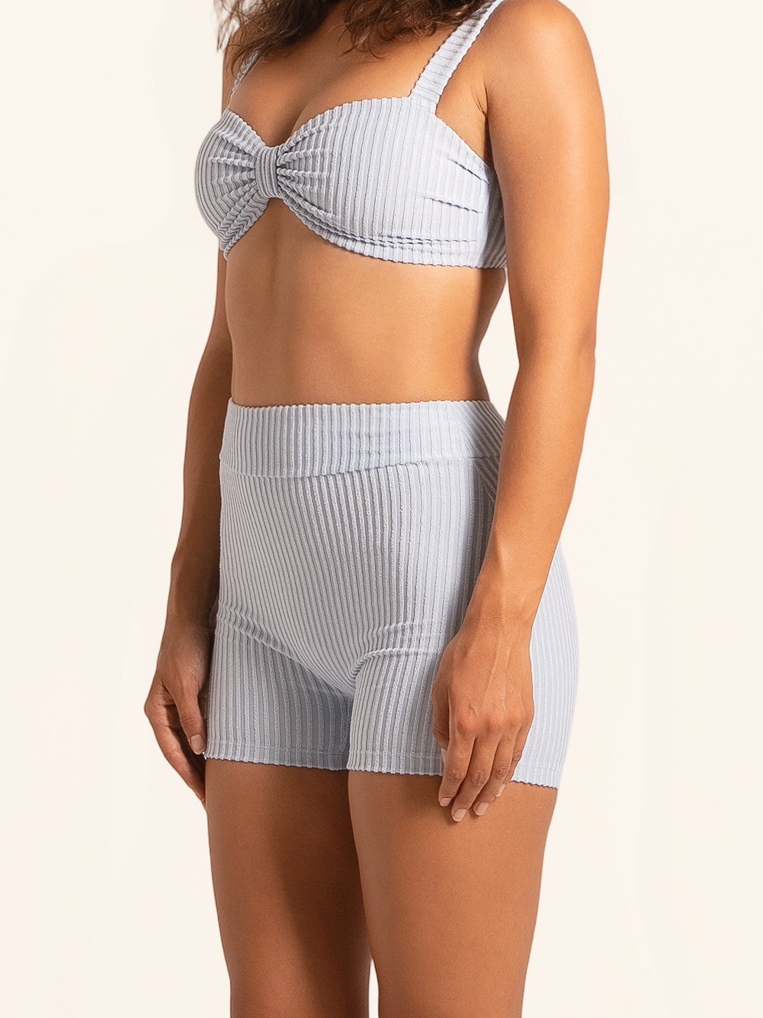 Women’s light blue swim shorts with comfortable stretch fabric.