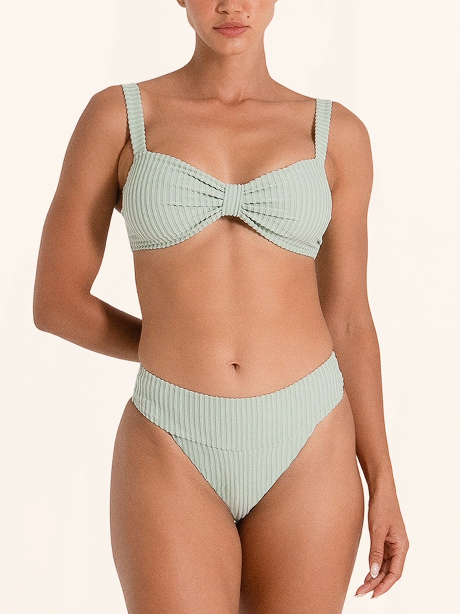 Light green high waist bikini bottom with ribbed fabric.