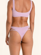 Lilac bikini bottom with side cut-out style.