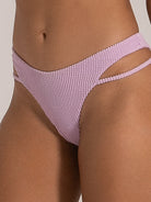 Close-up of lilac textured bikini bottom with double side strap cutout design