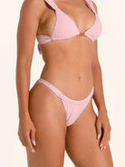 Lilac bikini bottom with flattering high cut and textured fabric.