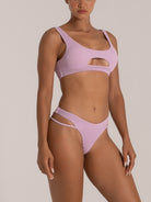 Lilac bikini set featuring cutout top and high-waisted bottom with dual straps