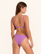High cut lilac bikini bottom with textured detailing.