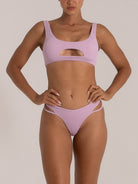 Full frontal view of lilac textured bikini bottom with high-leg cut and side straps