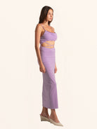 Full body front angle of lilac maxi dress with bodycon fit and cut out waist