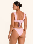 Swimwear bottom in lilac color featuring high waist design and full coverage.