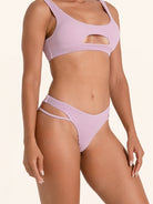 Lilac swimwear bottom with modern high waist fit.