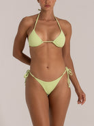 Triangle-cut lime bikini bottom with crinkle texture and tie details