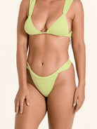 Bold lime green bikini bottom with sculpting fit and minimal seams.