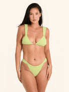 Lime green bikini top with thick supportive straps and back tie closure.