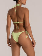 Back view of lime green textured bikini bottom with tie sides