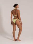 Back view of textured lime green triangle bikini with tie straps