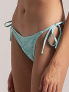 Ocean Mystery cheeky bikini bottom in light blue with textured fabric and minimal coverage