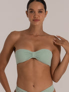 Front view of strapless mint bikini top with soft ribbed fabric