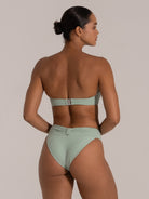 Back view of mint ribbed strapless bikini top with metal clasp closure