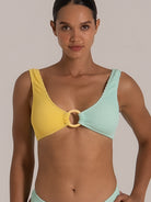 Front close-up of a mint and yellow textured bikini top with ring detail and thick straps