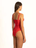Rear angled profile of the modest Ruby wrap tankini set, illustrating the comfortable, full-torso coverage and premium ribbed texture.