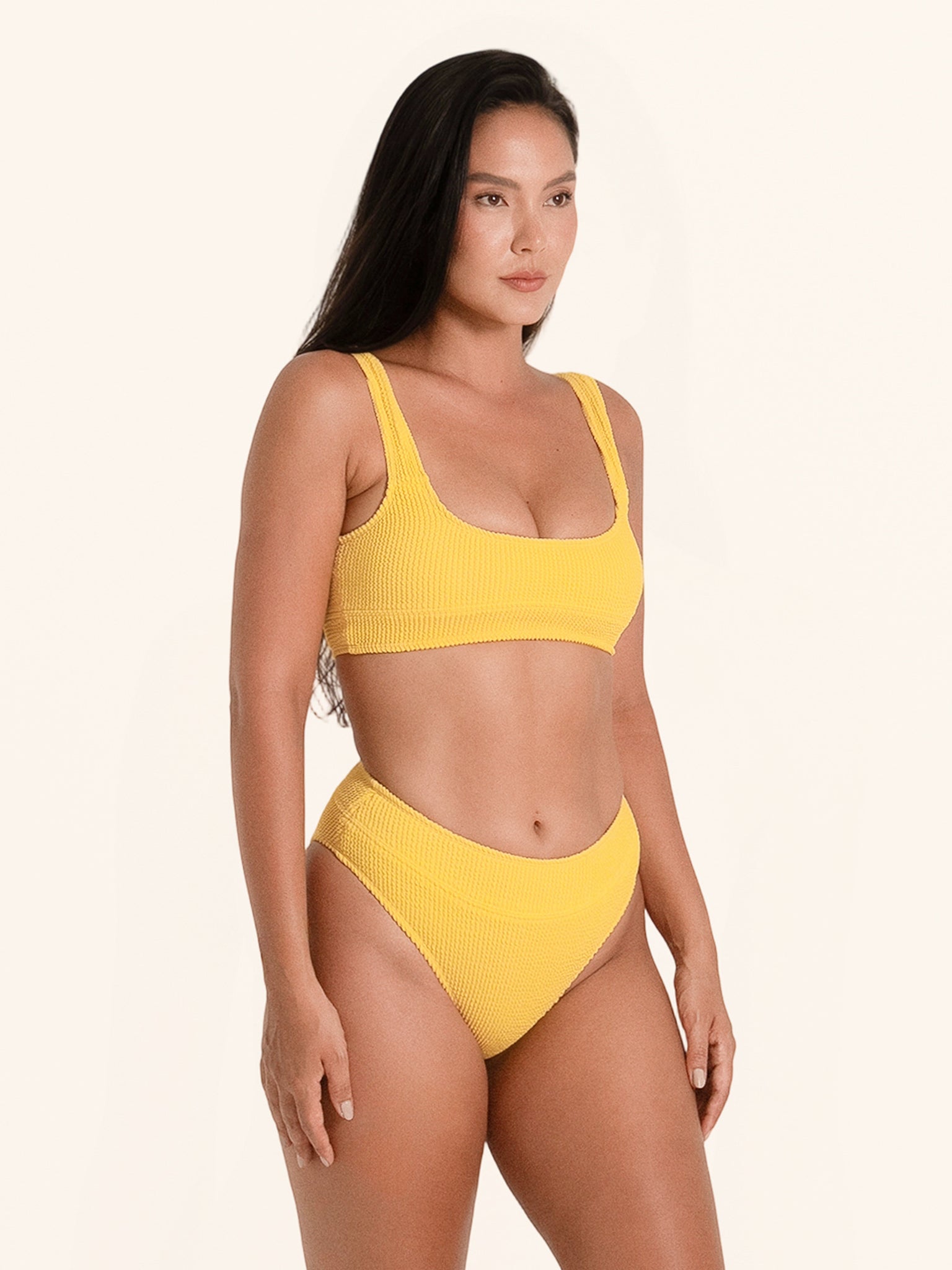 Mustard yellow bikini top with square neckline and thick straps.