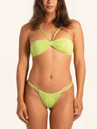 Neon green bikini bottom with strappy waist detail.