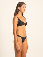 Side profile view of the supportive V-neck ribbed bikini top in Onyx black, showcasing the adjustable straps and seamless construction.