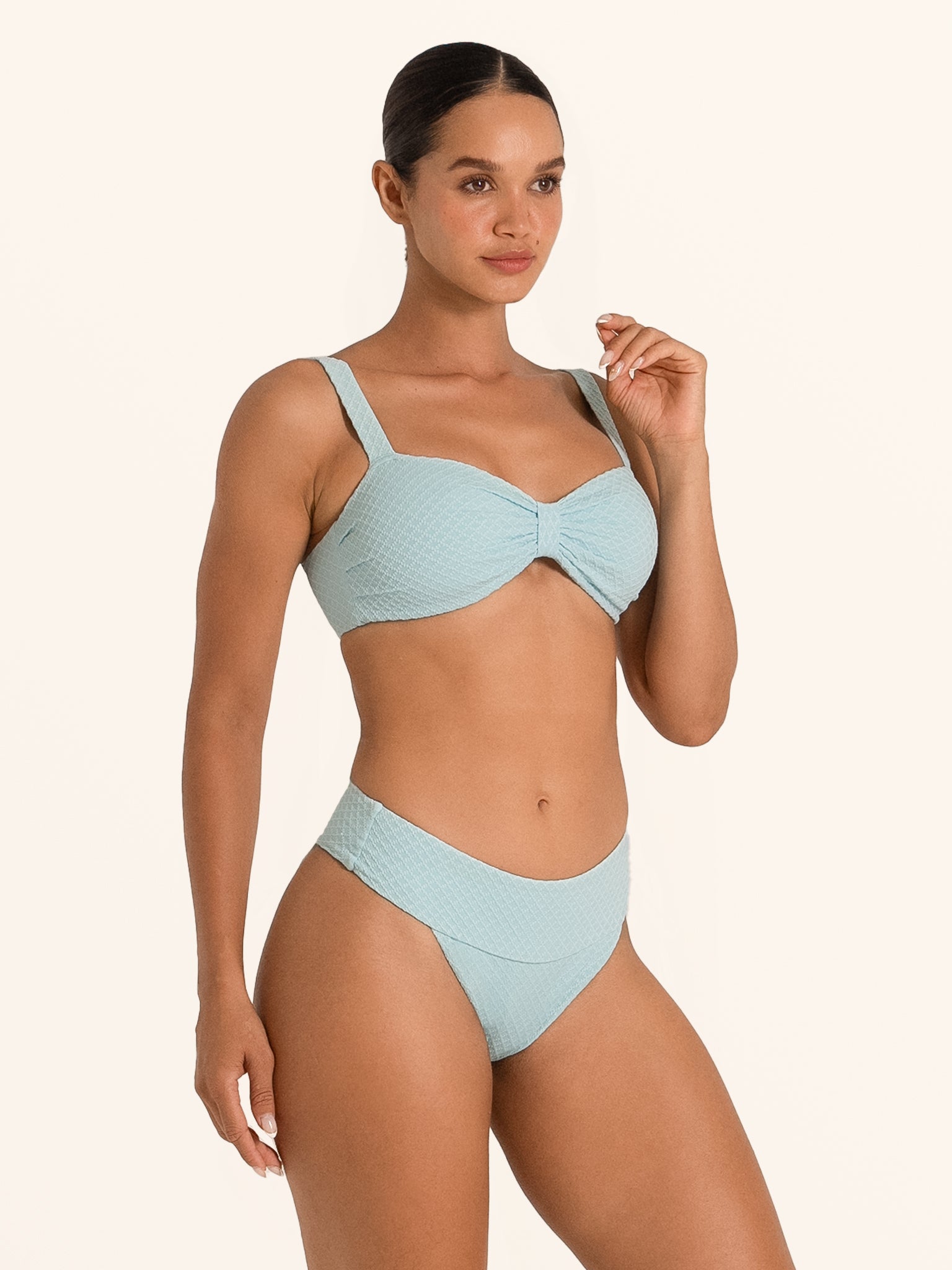 Back view of Ocean Mystery textured bikini bottom in light blue with flattering coverage.
