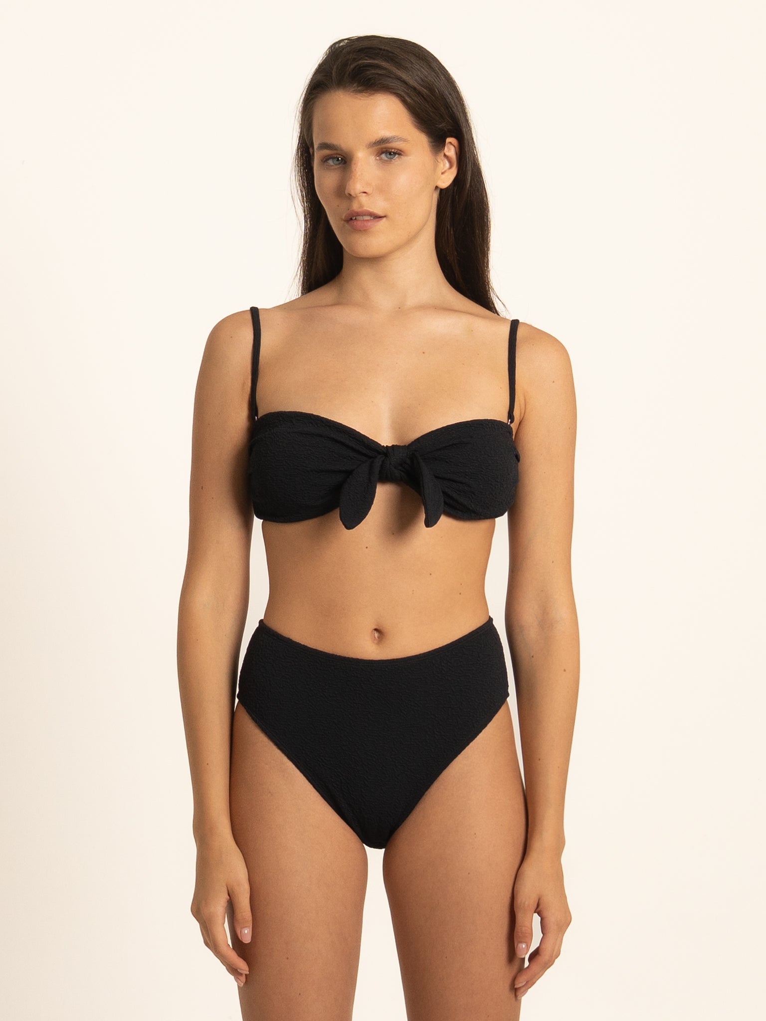 Ocean Mystery black sweetheart bikini top with front knot detail and supportive straps.