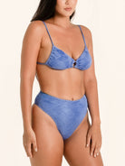 OCEAN MYSTERY blue bikini top with soft fit and adjustable shoulder straps.