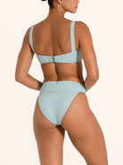 Front view of Ocean Mystery light blue textured high waist bikini bottom.