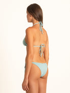 Ocean Mystery halter bikini top in light blue featuring adjustable ties and classic triangle design.