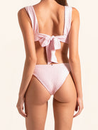 OCEAN MYSTERY light pink bikini bottom with sculpting design and soft stretch fabric.