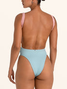 Ocean Mystery colorblock one piece swimsuit in pink and blue with cut out and ring detail, back angle