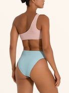 Side back view of Ocean Mystery asymmetric pink and blue cut out one piece swimsuit