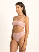 Model wearing Ocean Mystery red gingham square neck bikini top with flattering modern cut.