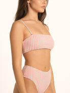 Side profile of Ocean Mystery red gingham square neck bikini top featuring minimal stretch fit.